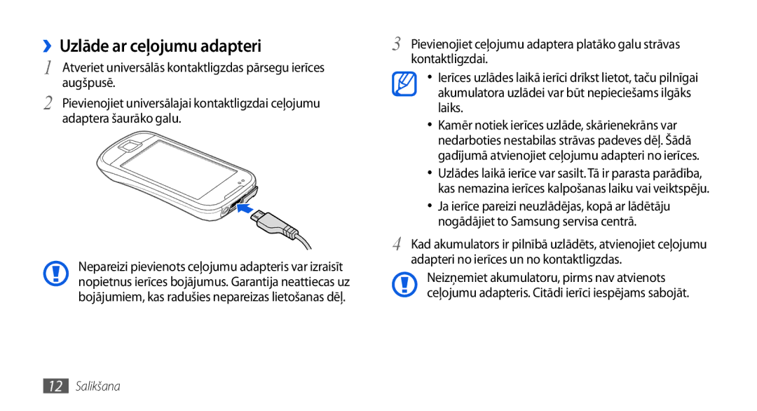 Samsung GT-I5800DKASEB, GT-I5800CWASEB manual ››Uzlāde ar ceļojumu adapteri 